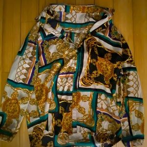 Button Down Dressy Female shirt. Pair with dressy pants or tied up as a crop top